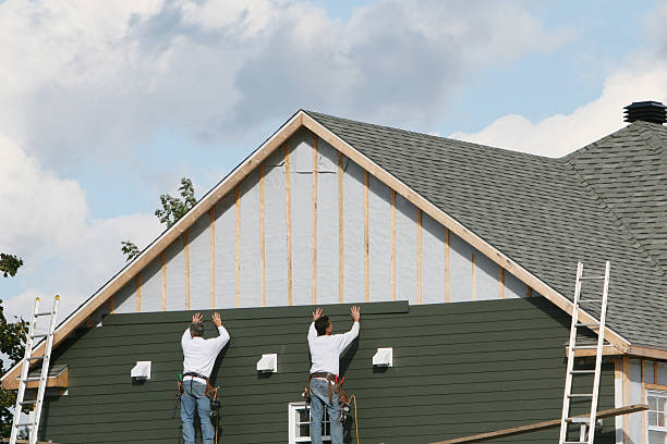 Professional Siding technician working in Saint Charles, IL